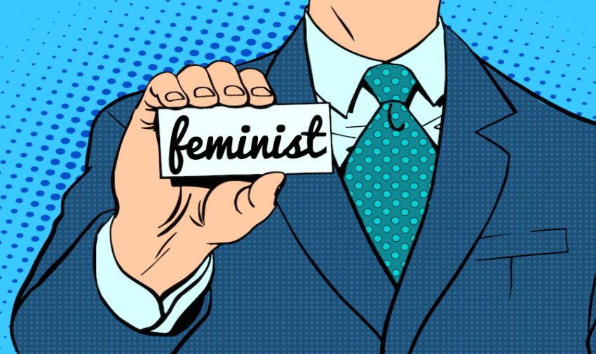 Man holding feminist card